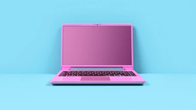Pink laptop on blue background. Two clipping paths included