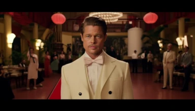 Brad Pitt as Aldo Raine from the movie Inglourious Basters in the style of the director Wes Anderson, full body shot, he is in the center of the photograph looking directly at the camera. He has a pencil moustache. He is wearing a white tuxedo jacket, black bow tie, red rose lapel clip, black pants. The background is the lobby of an art-decó movie theatre designed in the style of Wes Anderson in a Wes Anderson color palette, symmetrical, whimsical, ornate, planimetric composition,