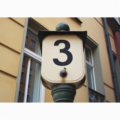 clipart illustration, realistic, photorealism, photo, extreme close-up, house number 3, enamel, street sign, Europe,