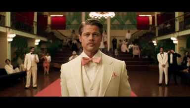 Brad Pitt as Aldo Raine from the movie Inglourious Basters in the style of the director Wes Anderson, full body shot, he is in the center of the photograph looking directly at the camera. He has a pencil moustache. He is wearing a white tuxedo jacket, black bow tie, red rose lapel clip, black pants. The background is the lobby of an art-decó movie theatre designed in the style of Wes Anderson in a Wes Anderson color palette, symmetrical, whimsical, ornate, planimetric composition,