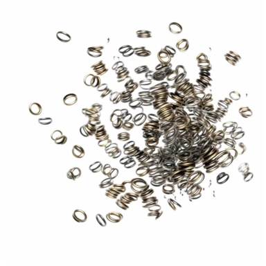 tiny metal springs in flight, white background, clipart