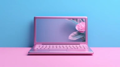 Pink laptop on blue background. Two clipping paths included